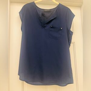 Navy short sleeve blouse with no size but fits like a medium
